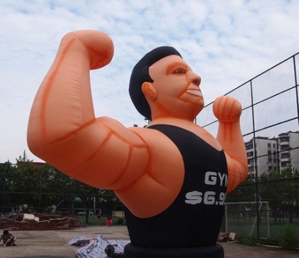 INFLATABLE MUSCLE MAN CARTOO...