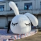 white inflatable rabbit head...