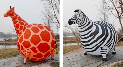 inflatable fat giraffe carto...