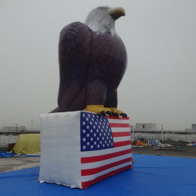 inflatable eagle with flag i...