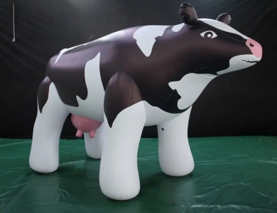 advertising inflatable cow i...